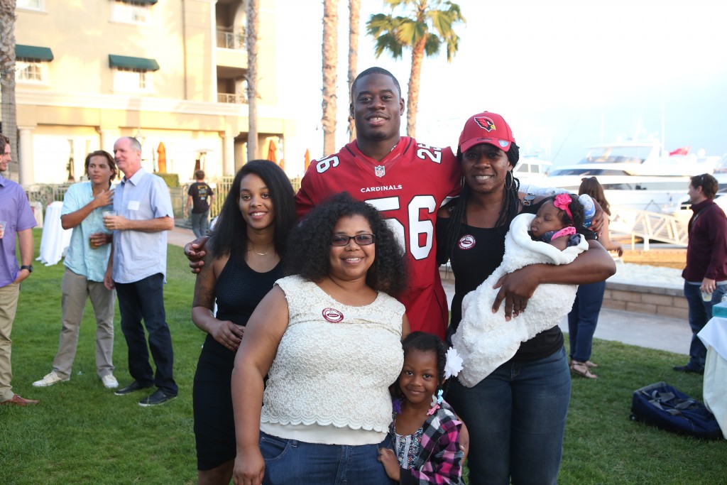 Mr. Irrelevant, Gerald Christian, and his family. — Photo by Jim Collins ©