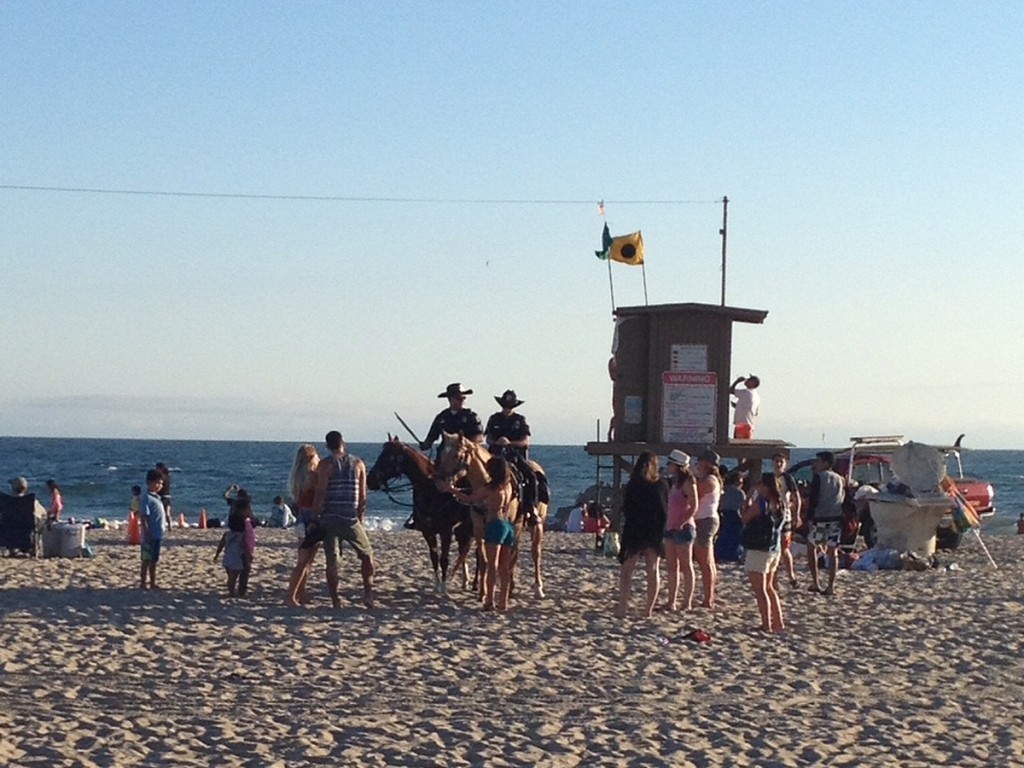 The Newport Beach Mounted Enforcement Unit at work on July 4. — Photo by David McGill ©