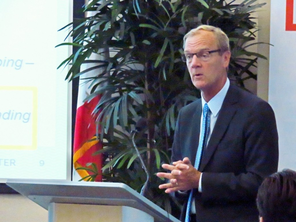 Poseidon Water LLC Executive Vice President Andrew Kingman speaks at Newport Beach Chamber of Commerce’s monthly Wake Up! Newport meeting on Thursday. — Photo by Sara Hall ©