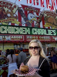 Off the Menu columnist Catherine Del Casale gets ready to dig into a triple decker Krispy Kreme burger