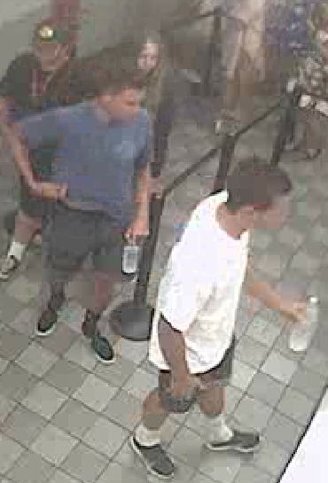 The leaf blower suspects were seen on video surveillance at the Newport Beach theater. — Photo courtesy Newport Beach Police Department