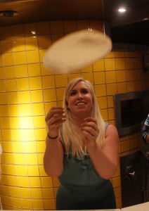 Catherine tries her hand at dough tossing