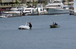 Trying to right a capsized boat