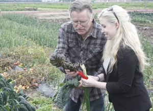 Pascal and Catherine harvesting Pascal's garden