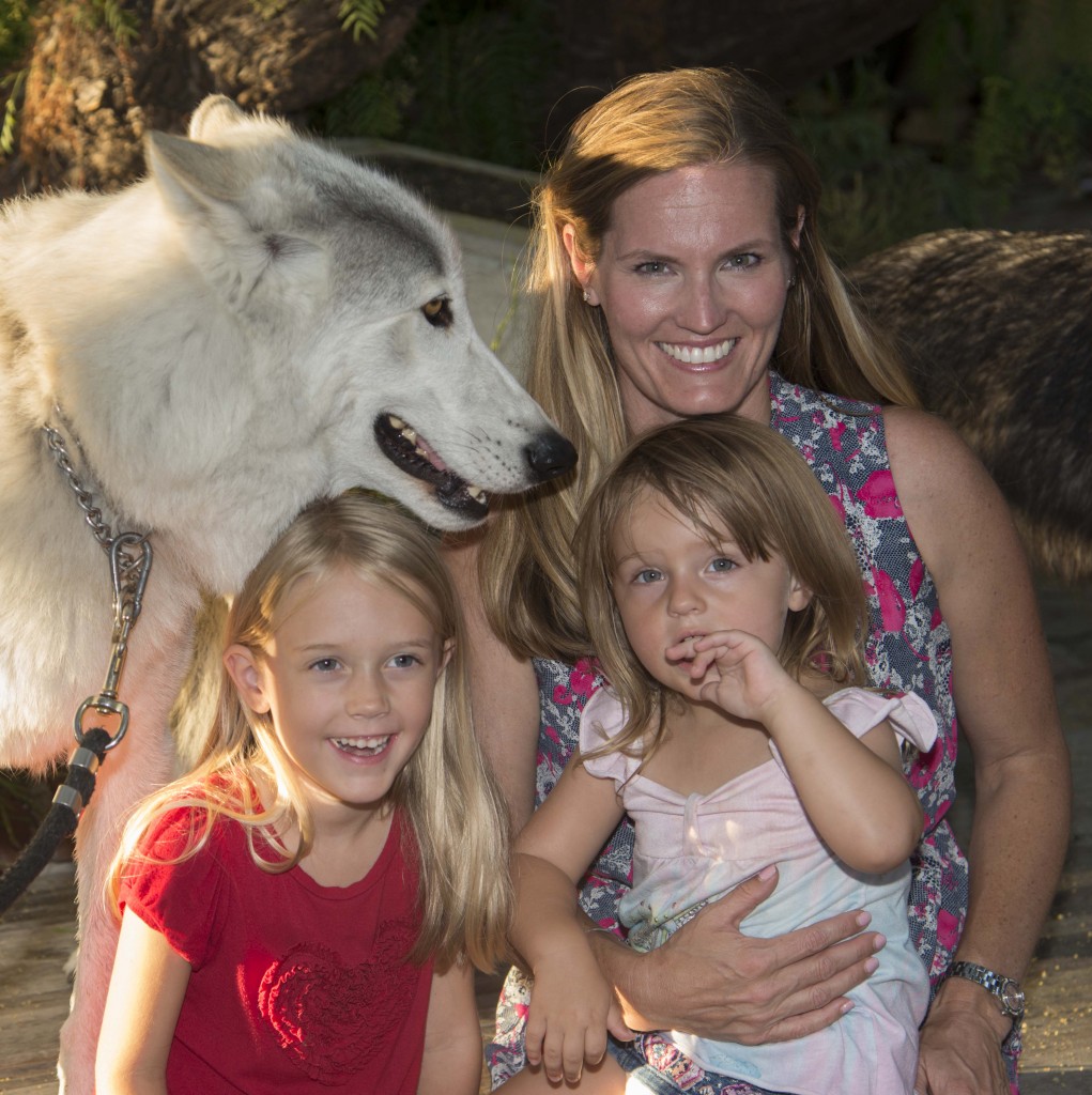 Demu the wolf with Malia, 5, and Alessia, 2, Piantanida and their mom, Dawn. — Photo by Lawrence Sherwin ©