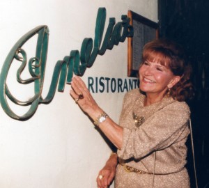 Amelia in front of her restaurant