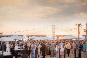 Guests enjoyed the Gala reception with hors d‘oeuvres provided by Fig and Olive under magnificent skies. / Photo Credit: J. Christopher Launi Photography