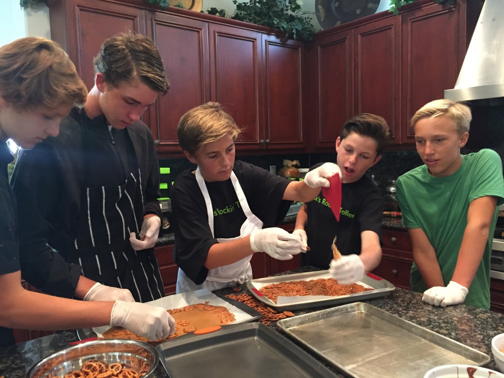 Jack McKenna (center) and his employees making toffee. — Photo courtesy Jacks Rockin’ Toffee ©