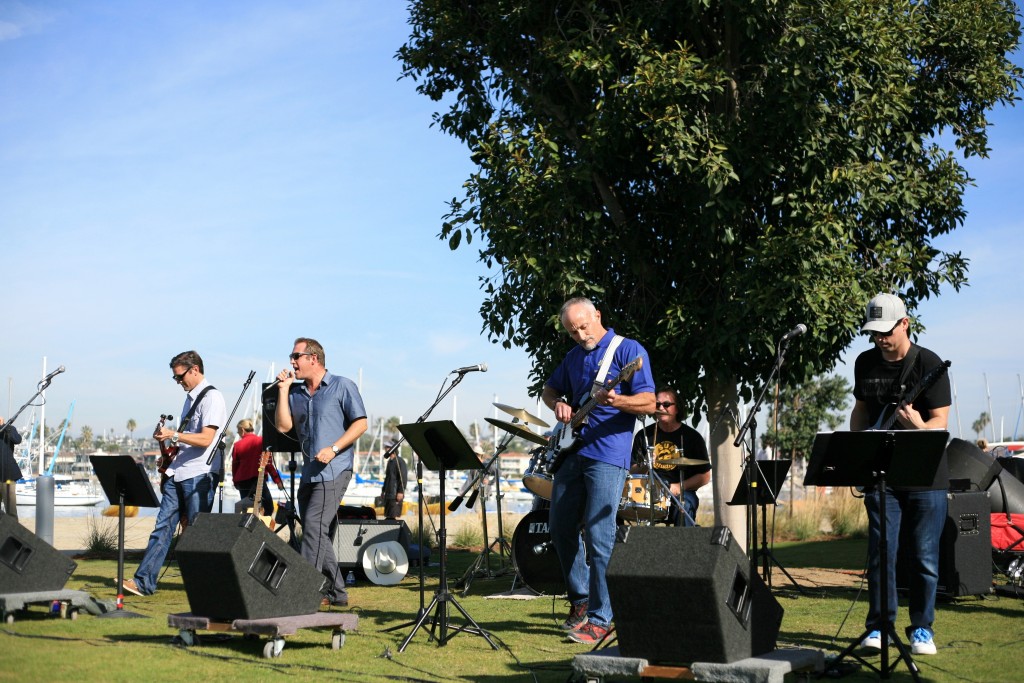 The band Public Rocks, comprised of all public employees (from Newport Beach and other municipalities) including NB City Manager Dave Kiff (middle) and Deputy Public Works Director and City Engineer Mark Vukojevic (far left), provided live music at the event. — Photo by Sara Hall ©