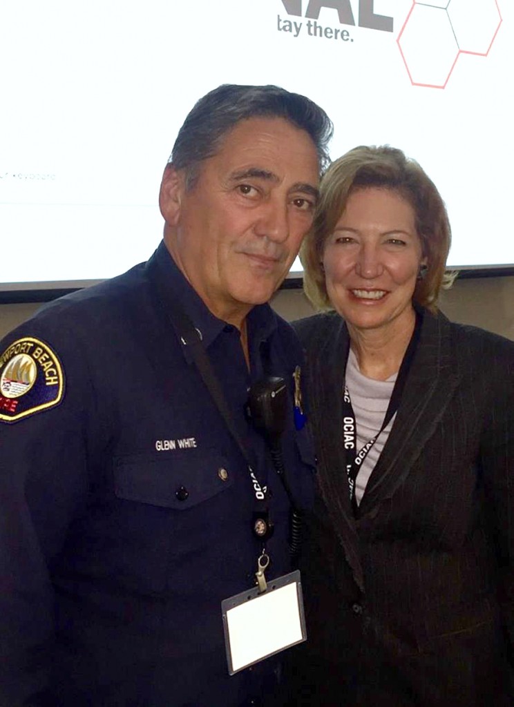 Newport Beach Fire Department Captain Glenn White with Orange County Sheriff Sandra Hutchens. — Photo courtesy the Newport Beach Fire Department ©