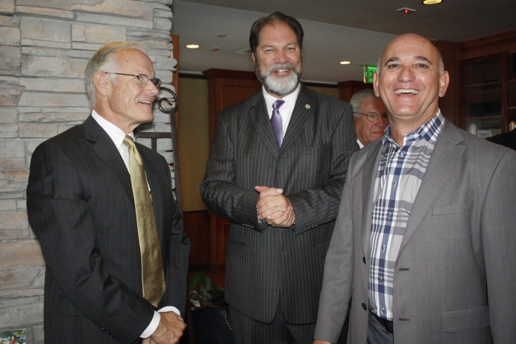 Newport Beach citizen of the Year Paul Watkins is congratulated by California State Senator John Moorlach and Newport Beach Chamber of Commerce President Steve Rosansky — Photo by Christopher Trela©