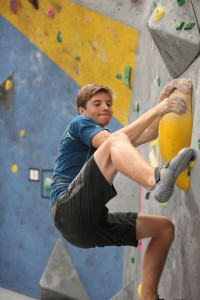 Garrett Keyes climbing a rock wall (photo credit: Diana Keyes)