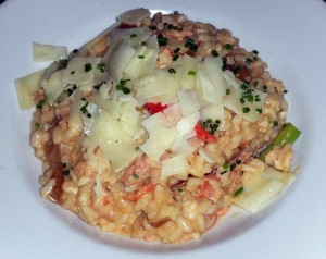 Lobster and truffle risotto with asparagus, caramelized onion, white wine, and parmesan