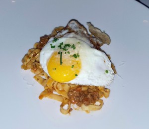 “Best Worst Mistake” house-made tagliatelle, smoky Bolognese sauce, a fried egg, nd aparmesan, 