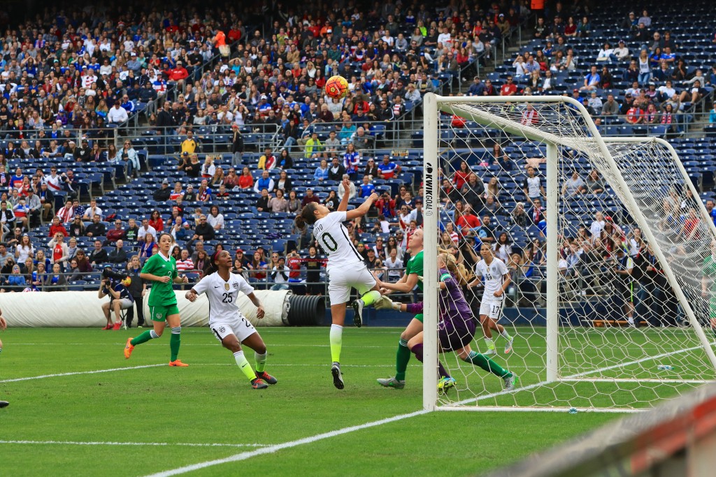 U.S. WNT player Carli Lloyd (center, #10) goes for a goal during the season opening game against Ireland on Jan. 23. — Photo by Jim Collins ©