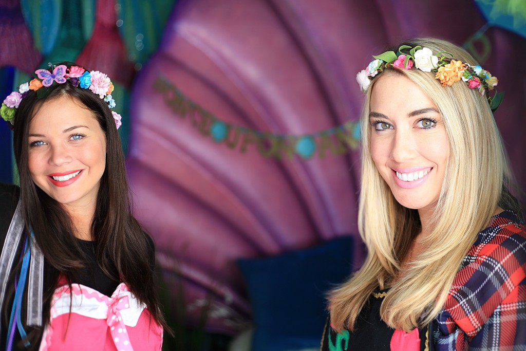 Once Upon an Island general manager Heather Burbich (left) and owner Bree Baker pose for a photo in their Balboa Island shop. — Photo by Sara Hall ©