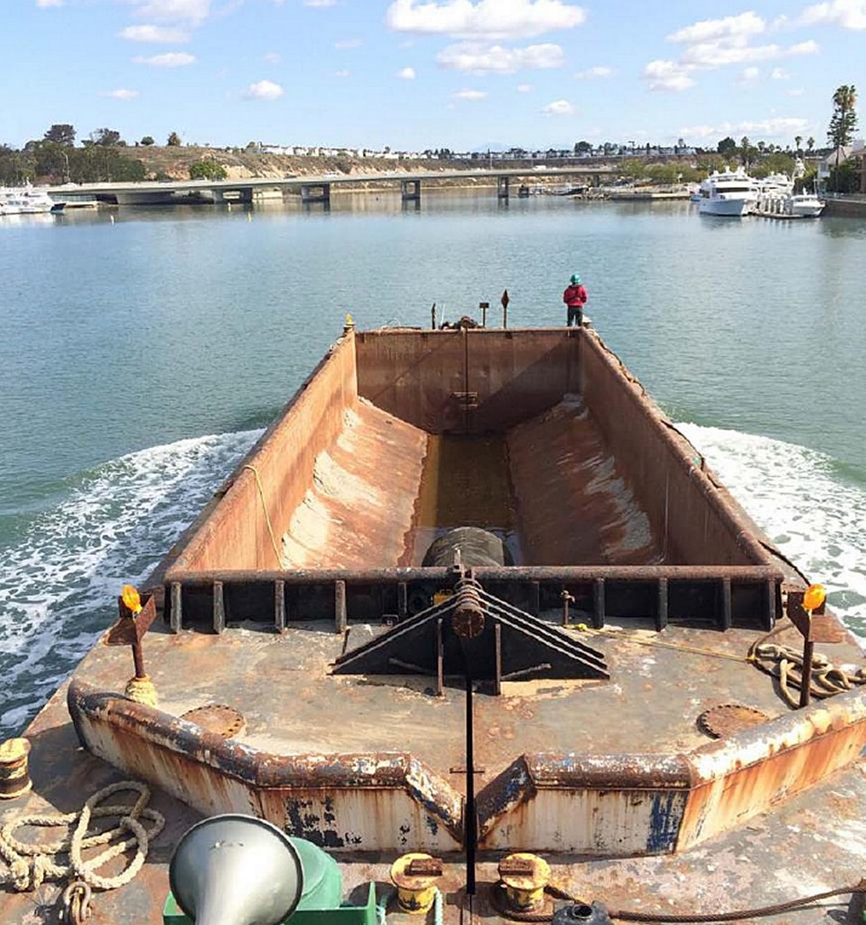 An example of the type of scow staff suggested the city consider purchasing for small dredging projects in Newport Harbor. — Photo courtesy city of Newport Beach ©