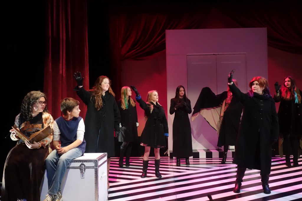 Boy (Dominic Brack) and Grandma (Sarah Sparks) (front, left) look on as the witches perform during a dress rehearsal for the South Coast Repertory Junior Players’ production of “The Witches,” adapted for the stage by David Wood from Roald Dahl’s novel. The show will be performed in the Nicholas Studio between March 12 to 20. — Photo courtesy South Coast Repertory ©