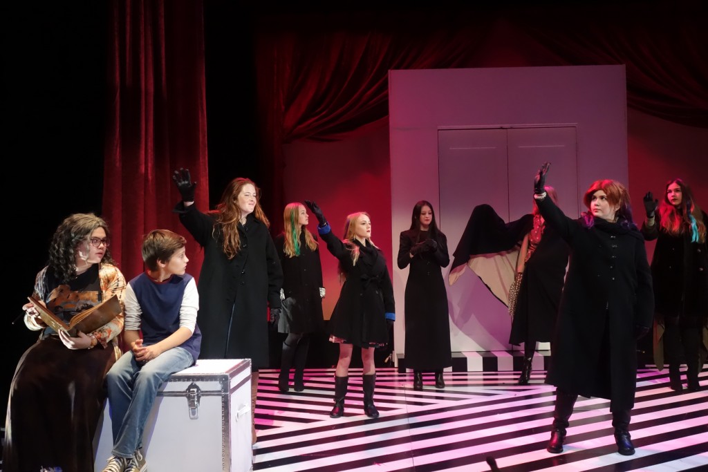 Boy (Dominic Brack) and Grandma (Sarah Sparks) (front, left) look on as the witches perform during a dress rehearsal for the South Coast Repertory Junior Players’ production of “The Witches,” adapted for the stage by David Wood from Roald Dahl’s novel. The show will be performed in the Nicholas Studio between March 12 to 20. — Photo courtesy South Coast Repertory © 