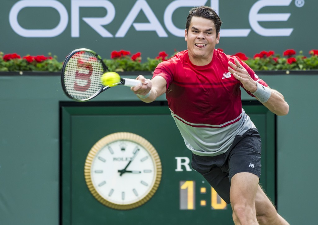 Milos Raonic makes a final push in the finals, but ultimately lost to Novak Djokovic. — Photo by Lawrence Sherwin © 