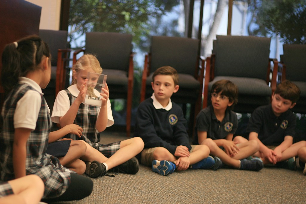 Students study an owl talon during the program. — Photos by Sara Hall ©