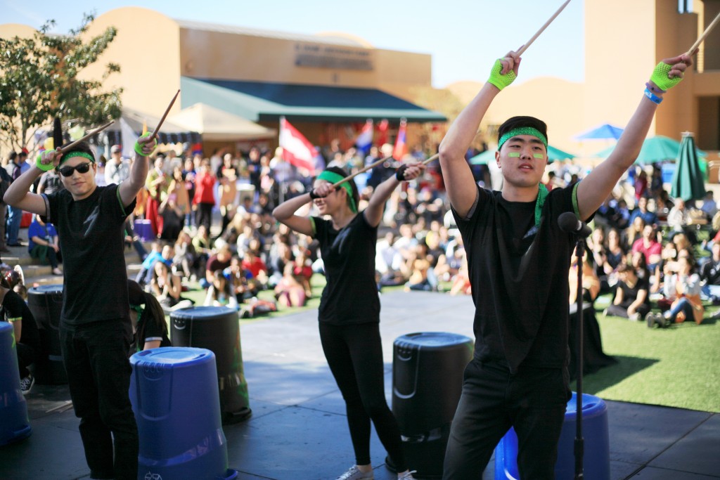 Sage Hill students perform Nanta drumming at the fair. — Photo by Sara Hall ©