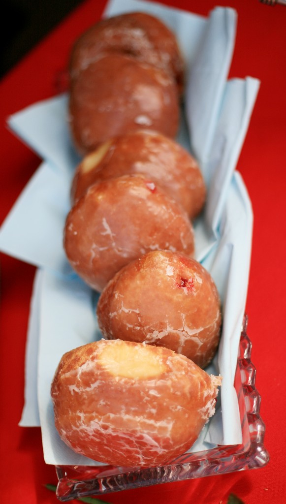 A tray of jelly-filled pacskis (Polish donuts). — Photo by Sara Hall ©