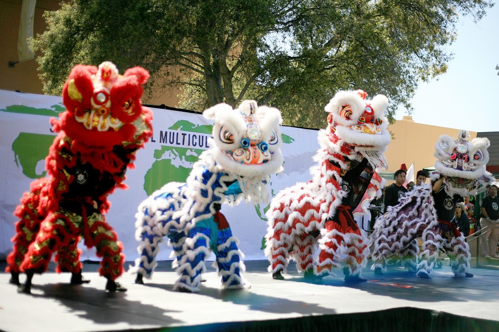 Traditional Chinese lion dancers from the Ane Thanh troupe perform during the 15th Annual Sage Hill Multicultural Fair on Saturday. — Photo by Sara Hall ©