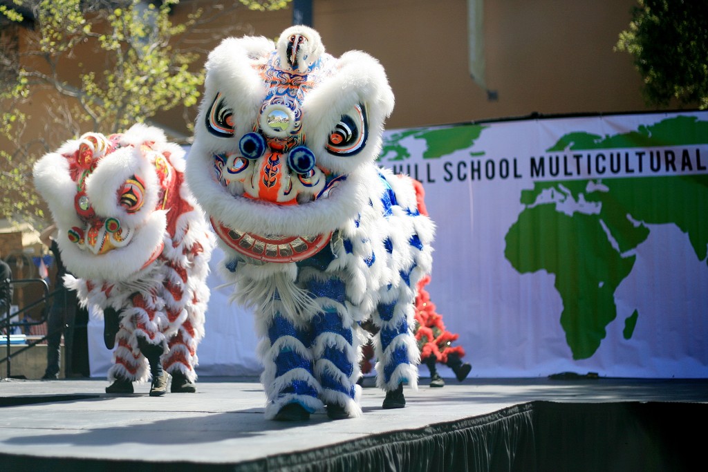 Traditional Chinese lion dancers from the Ane Thanh troupe perform during the 15th Annual Sage Hill Multicultural Fair on Saturday. — Photo by Sara Hall ©