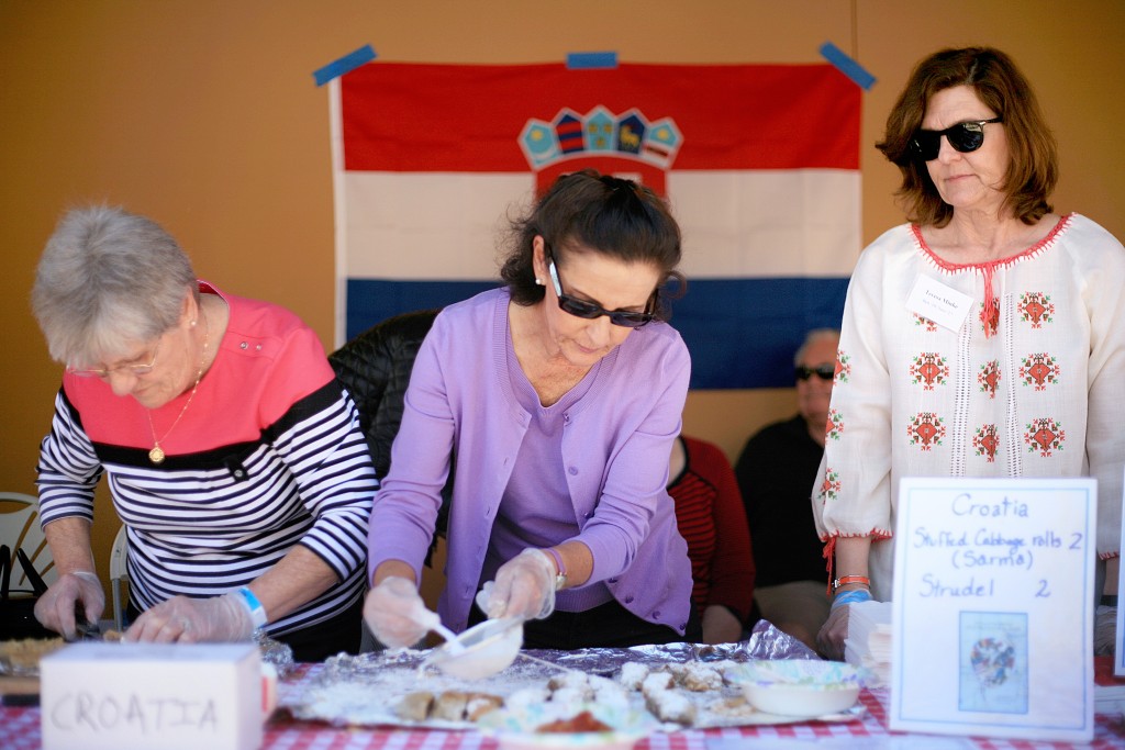 (left to right) Family members Bonnie Mihovilovich, Norma Chizek, and Teresa Minke help at the Croatia food booth during the Sage Hill Multicultural Fair on Saturday. — Photo by Sara Hall ©