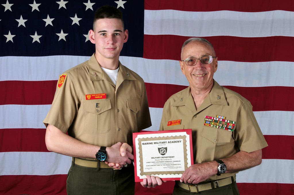 Marine Military Academy senior Charles Chandler of Newport Beach accepts the Marine Military Academy March 2016 Cadet of the Month award from Superintendent Col R. Glenn Hill. — Photo courtesy Marine Military Academy ©