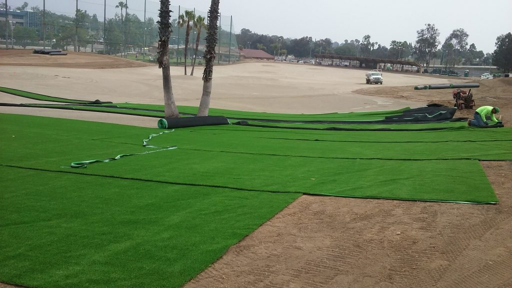Synthetic turf gets rolled out at the Newport Beach Golf Club driving range recently. The turf is part of the club’s remodel project. — Photo courtesy Newport Beach Golf Club ©