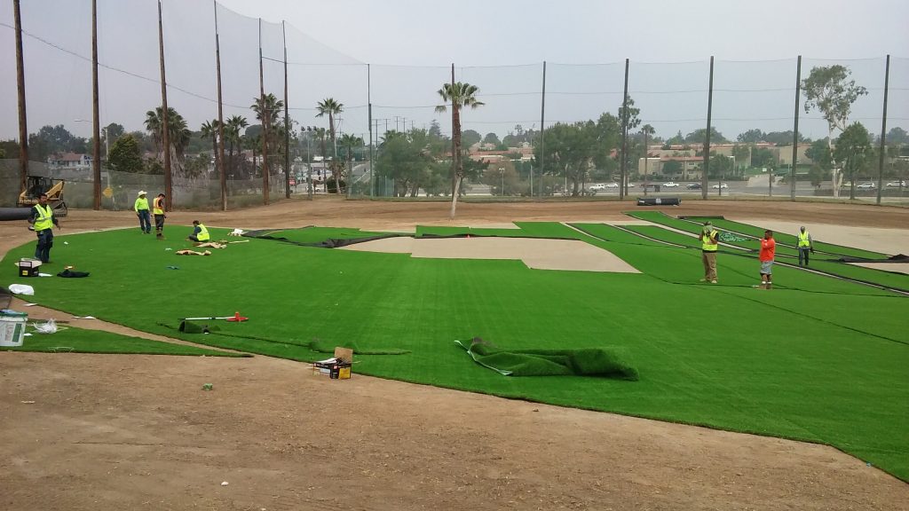 Synthetic turf gets rolled out at the Newport Beach Golf Club driving range recently. The turf is part of the club’s remodel project. — Photo courtesy Newport Beach Golf Club ©