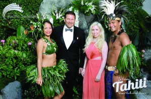 NB Indy writers Christopher Trela and Catherine Del Casale pose for a Tahiti postcard