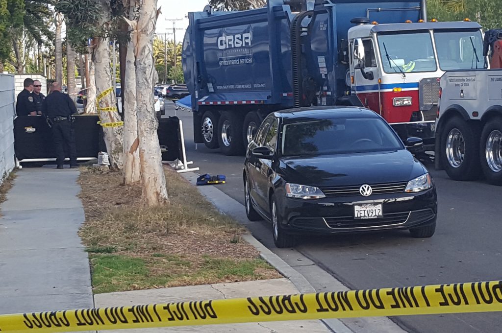 Police remained on scene where a trash truck hit an 8-year-old boy in Newport Beach for several hours after the accident. — Photo by Christopher Trela ©