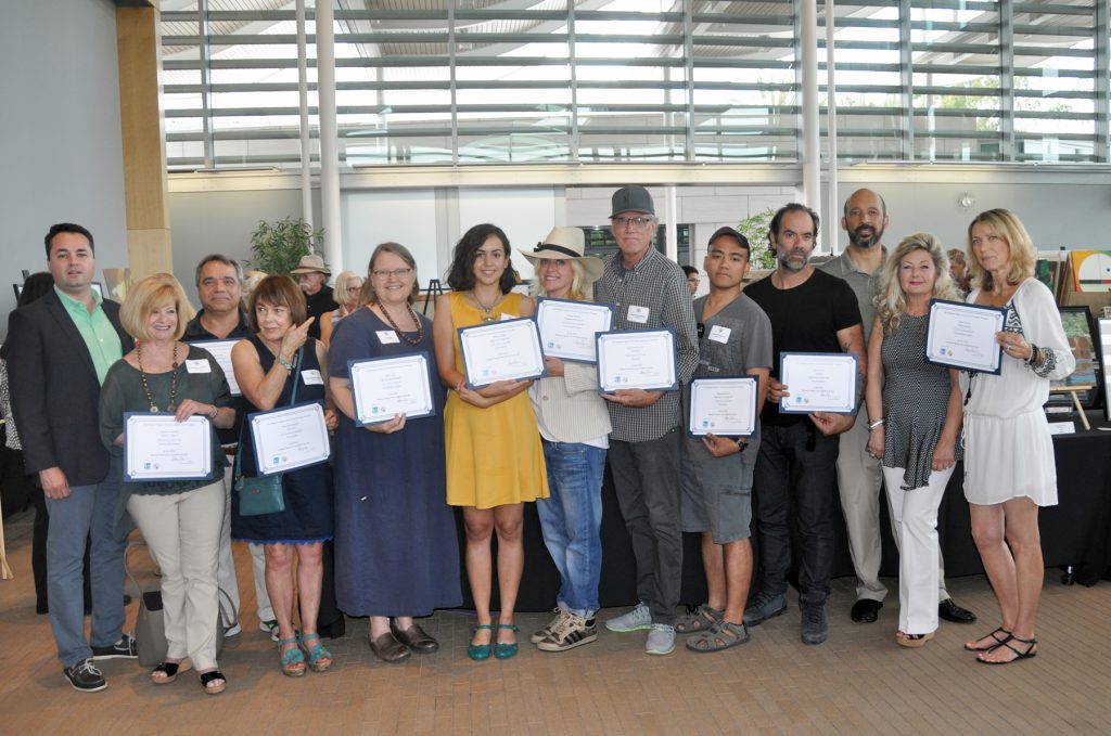 (left to right): Mayor Pro Tem Kevin Muldoon, Stephanie Godbey, Reza Safa, Diana Ghoukassian, Carol Colin, Viviana Carlos, Krista Hartling, Mark Hackstedde, Roland Escalona, Dante Korda, Joseph Lewis III, judge for the exhibition, Arlene Greer, City Arts Commission Chair, and Janet Bludau. — Photo courtesy the city of Newport Beach ©