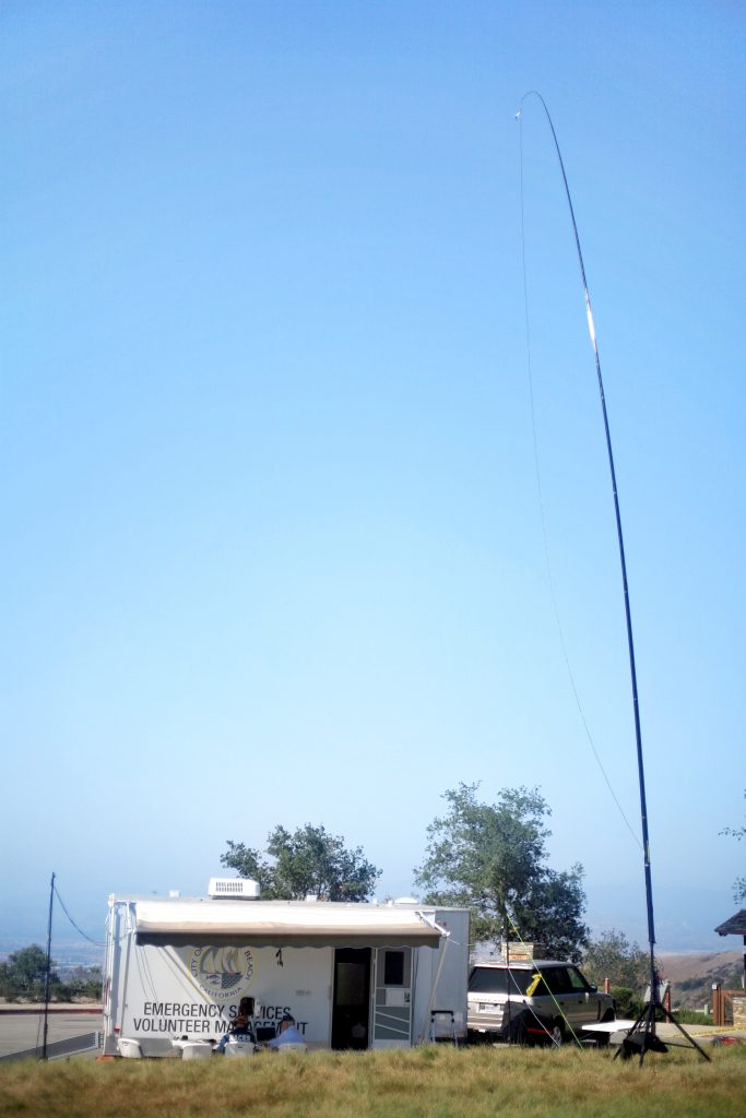 The Newport Beach RACES group set up the emergency services radio trailer and two tall wires in order to communicate with other radio operators around the world. — Photo by Sara Hall ©