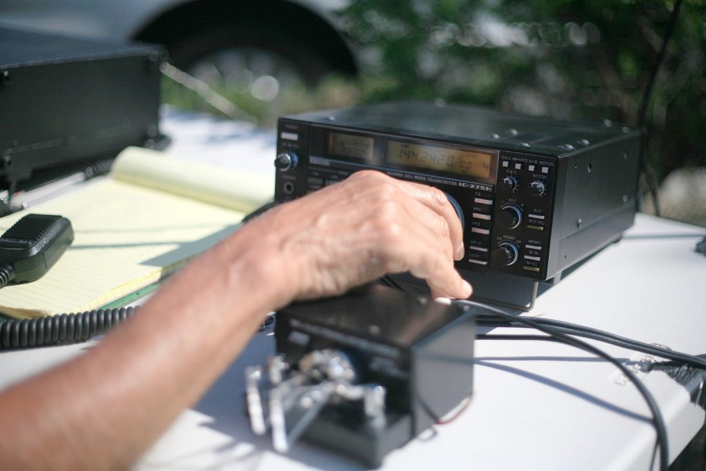 Roy Shlemon works his radio during the ARRL event on Saturday. — Photo by Sara Hall ©