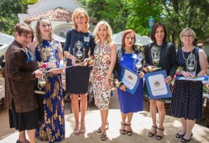 Kim Campbell (center) with Caregiver Honorees Ellie Nixon, Joanna Manczyk, Kathleen Furlong, Maria Elena Flores, Aileen Gaddi and Gincy Heins