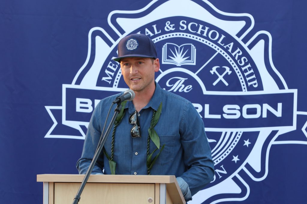 Ben Carlson's brother-in-law and statue artist, Jake Janz, speaks to the crowd on Wednesday. — Photo by Jim Collins ©