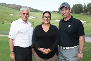 Gen. George Casey, Tatiana Rodriguez (veteran and now employee at the Tierney Center for Veteran Services), and Frank Talarico, Jr., Goodwill’s CEO and president.