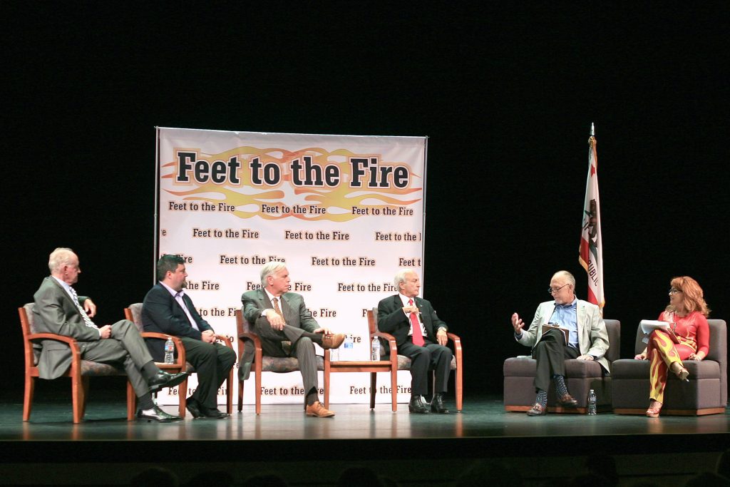 (left to right) Jeff Herdman and Mike Glenn for District 5; Phil Greer and Fred Ameri for District 7; and moderators Tom Johnson and Barbara Venezia, discuss Newport Beach topics at Feet to the Fire forum Wednesday. — Photo by Sara Hall ©