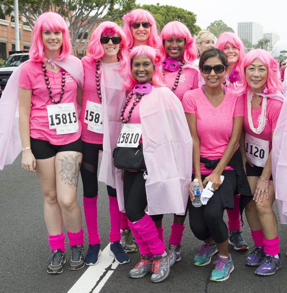 Runners from a previous Susan G. Komen Orange County Race for the Cure pose for a photo. — NB Indy file photo ©