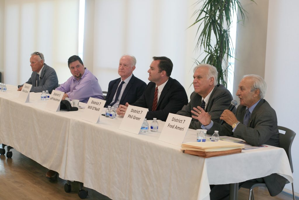 Newport Beach City Council candidates (left to right) Brad Avery for District 2, Mike Glenn and Jeff Herdman for District 5, and Will O’Neill, Phil Greer, and Fred Ameri for District 7, discuss local topics at the West Newport Beach Association candidate forum Wednesday. — Photo by Sara Hall © 