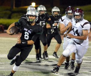 QB William Leong keeps the ball on a run for the Lightning