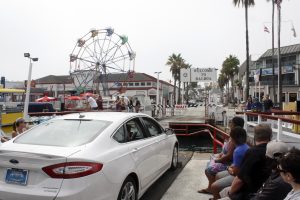 Tourists prepare to leave the Balboa Ferry for the Fun Zone