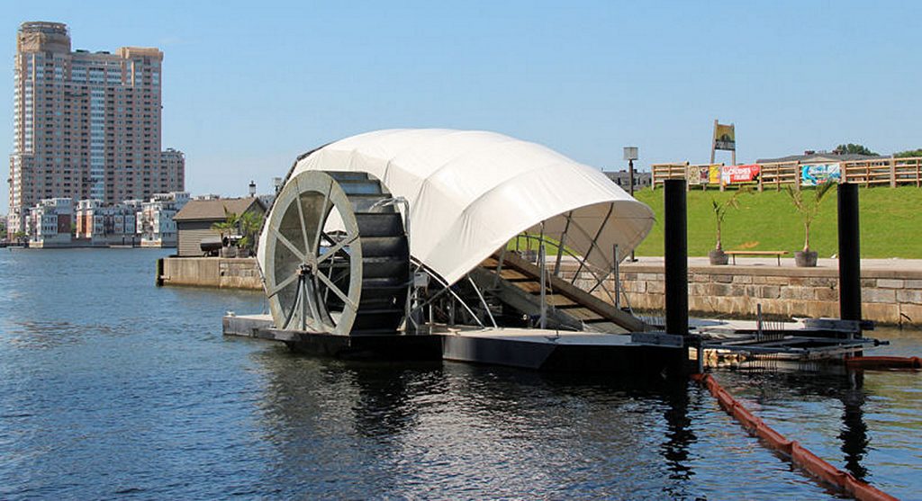 The solar-powered, debris-gathering water wheel in Baltimore, the same concept that is proposed for Newport Bay.  — Photo courtesy of Billy Dutton/Baltimore waterfront ©