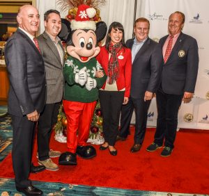 Chamber of Commerce President Steve Rosansky, Mayor Kevin Muldoon, Mickey Mouse, Disney Ambassador Allie Kawamoto, Newport Beach & Co. President and CEO Gary Sherwin, and Commodore David Beek. / photo by Lawrence Sherwin