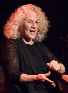 Carole King performing at the Candlelight Concert