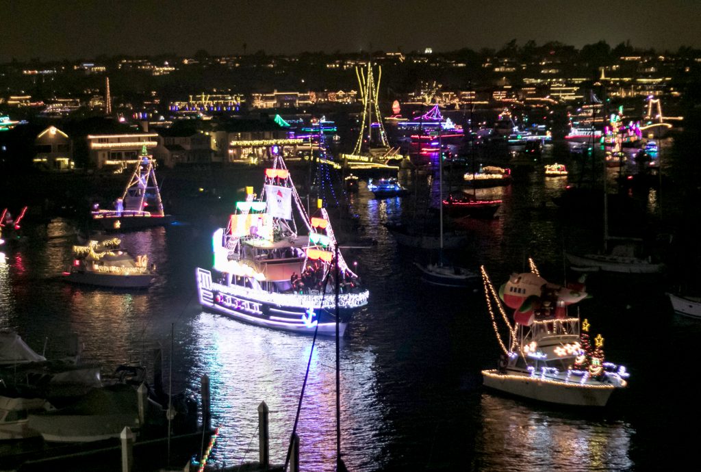 Boats parading in Newport Harbor / Photo by Jim Collins